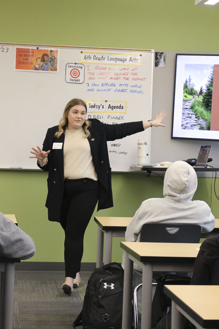 Lilly Zhukova, co-founder of local non-profit Slavic Vote, speaks with middle school students in Washougal, WA about connecting the dots between dreams and success. Photo courtesy Washougal School District
