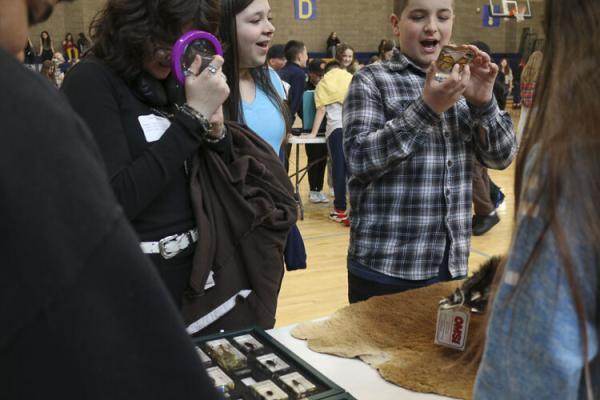 Marina Kuyan and Layton Chiccino, sixth grade students at Jemtegaard Middle School, participate in OMSI science activities in the JMS gym during Career Day. Photo courtesy Washougal School District
