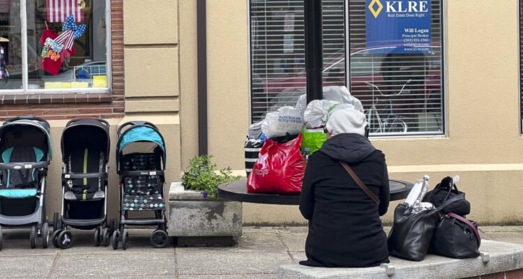 Homeless woman accused of desecrating American flags in downtown Camas, highlighting ongoing problems with homelessness and panhandling in the area.