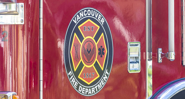 A structure fire in the Proebstel neighborhood of Vancouver prompts defensive firefighting strategy due to lack of nearby fire hydrants, but no injuries reported.