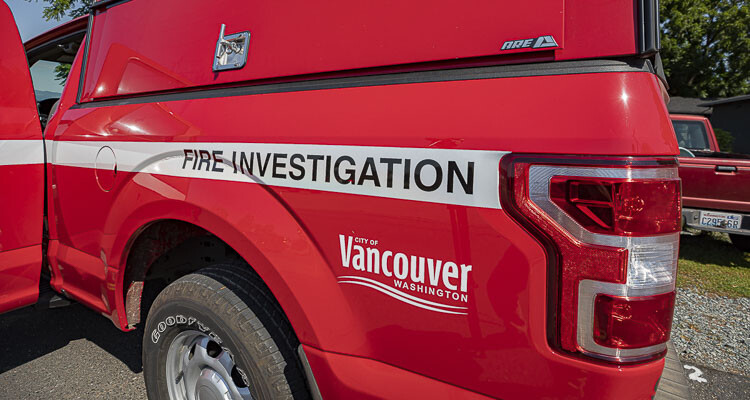 An adult male sustains serious injuries in a Vancouver garage fire, which was contained by firefighters, while the cause of the fire remains under investigation.