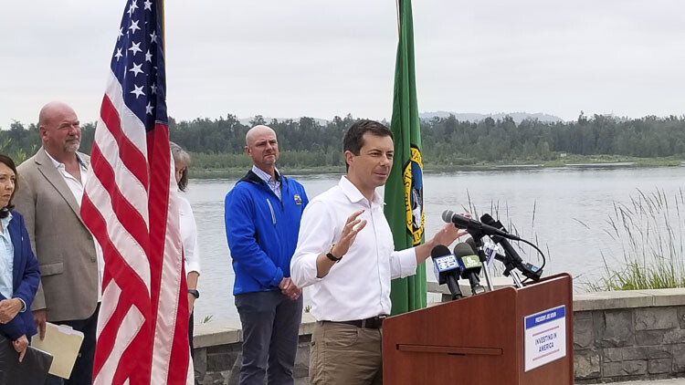 DOT Secretary Pete Buttigieg addresses local officials at the Port of Camas-Washougal, where he mentioned the importance of saving people time while traveling. Photo courtesy of John Ley