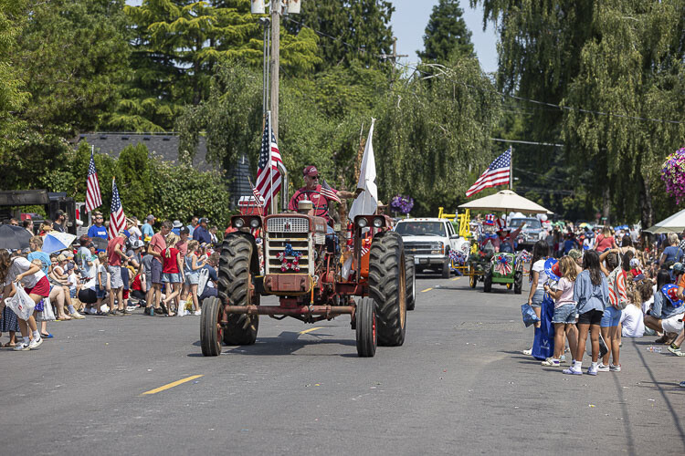 Rob Miller rode his trusted tractor in Tuesday’s parade. Photo by Mike Schultz