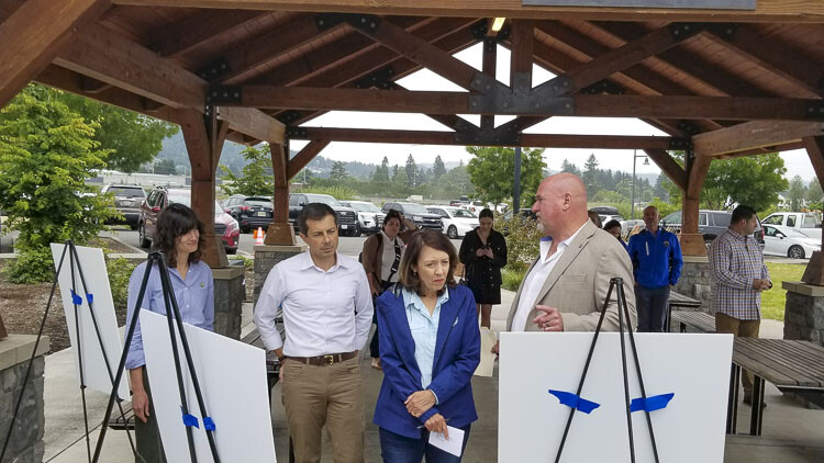 Washougal Mayor Dave Stuebe explains the importance and impacts of the 32nd Street Rail Underpass Project to DOT Secretary Pete Buttigieg, Senator Maria Cantwell, and Congresswoman Marie Glusenkamp Perez. The city is receiving the largest individual federal funding allocation from this program to eliminate rail crossings. Photo courtesy of John Ley