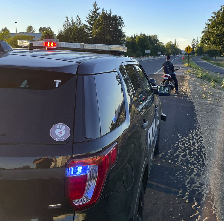 Sean Donaldson of the Vancouver Police Department pulled over this motorcycle rider Friday night. Donaldson, working with Target Zero, is educating riders and drivers of other vehicles on the importance of motorcycle safety. Photo courtesy Sean Donaldson