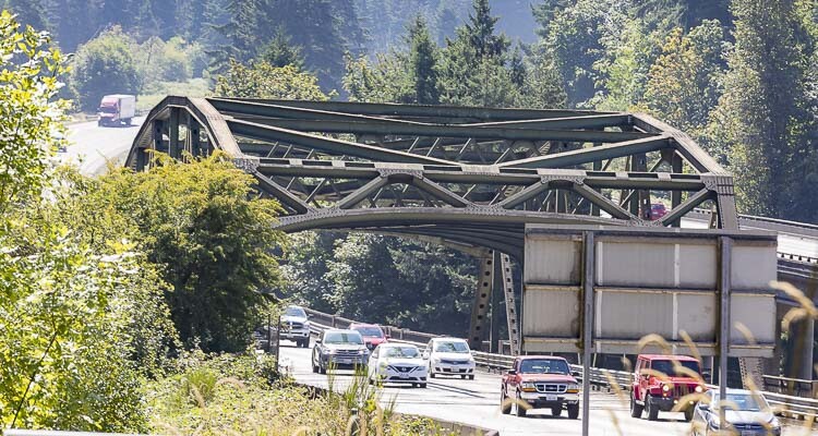 Travelers on northbound Interstate 5 near Woodland should brace for two months of substantial delays and lane reductions due to bridge repair work, with Friday evenings expected to experience over 50-minute delays and 7-mile backups; a temporary smart work zone system will provide real-time traffic updates to mitigate congestion.