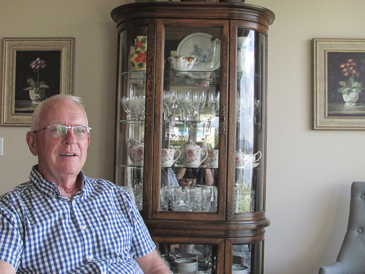 Keepsake glassware is displayed in an heirloom hutch at the home of Dean and Roxane Sutherland in Vancouver. Dean no longer has a home office and has disposed of thousands of books. Photo courtesy Marvin Case