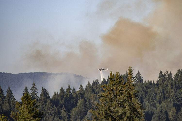 Multiple agencies were out in force to fight the Jenny Creek Fire near La Center Wednesday. Photo by Mike Schultz