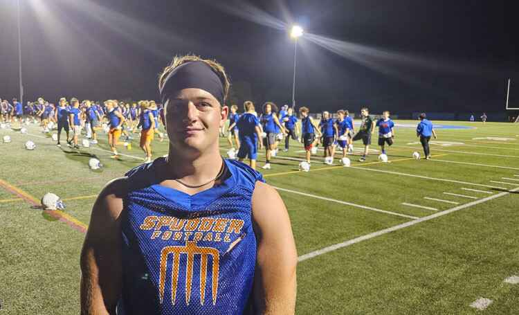 Ridgefield senior Danny McDonnell said he and his teammates love the tradition at Ridgefield, of being the first football players to get to work at a midnight practice on the first official day of high school football practice. Photo by Paul Valencia