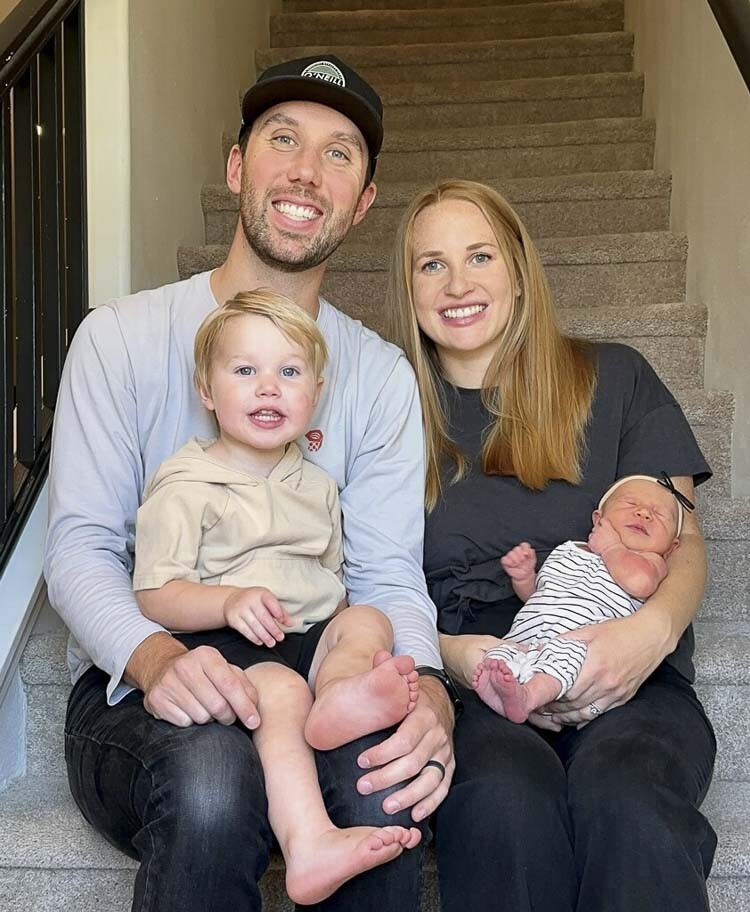 Justin and Brianna Kelly, with their children Asher and baby Aria. Brianna and Justin have a great story to share, as Aria arrived on her own time. Justin, with the help of a 9-1-1 dispatcher, delivered their baby on the side of I-205. Photo courtesy Kelly family