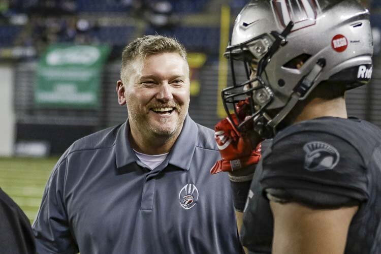 Rory Rosenbach was all smiles in this 2018 picture when he coached the Union Titans to a perfect season and a Class 4A state championship. Rosenbach, now the AD at Glacier Peak, returned to Vancouver on Friday to watch the Grizzlies face Evergreen. Photo by Mike Schultz