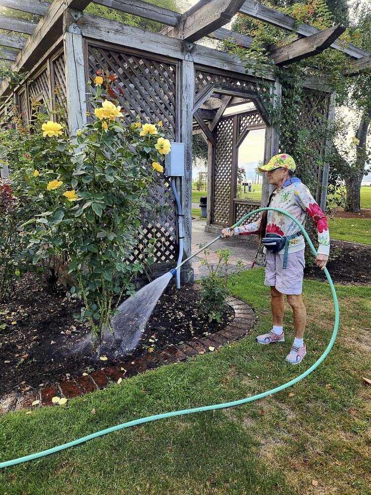 At the first meeting of the summer 2022 watering volunteers, the shed was reopened. Volunteer Elena Marchand dove in with the soon-to-retire Port employee and park steward, Doris Tillman. Photo courtesy Parkersville Heritage Foundation