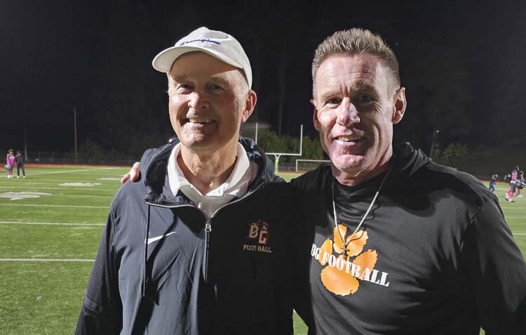 Dave Woodmark, the defensive coordinator at Battle Ground, and Mike Woodward, the head coach, won another big game at McKenzie Stadium on Thursday. The two also worked together from 1999 to 2003 at Mountain View. These days, they are helping Battle Ground’s rise. Photo by Paul Valencia