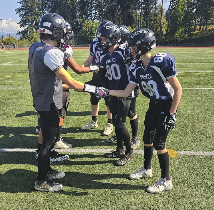 Clark County Youth Football stresses community and sportsmanship. Photo by Paul Valencia