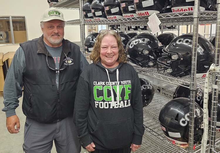 Terry and Mary Hyde have a love for football and children, and that is their motivation for running Clark County Youth Football, celebrating 40 years. Photo by Paul Valencia