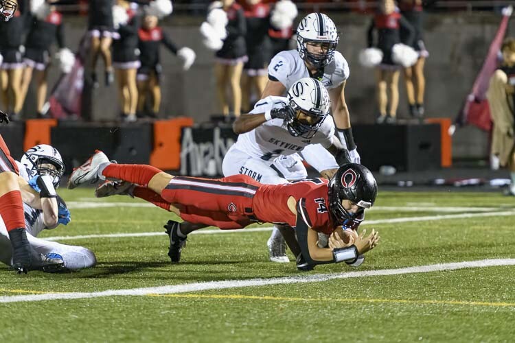 Beau Harlan dives into the end zone for the second of his two rushing touchdowns for Camas on Friday night against Skyview. Photo courtesy Howard Hawk