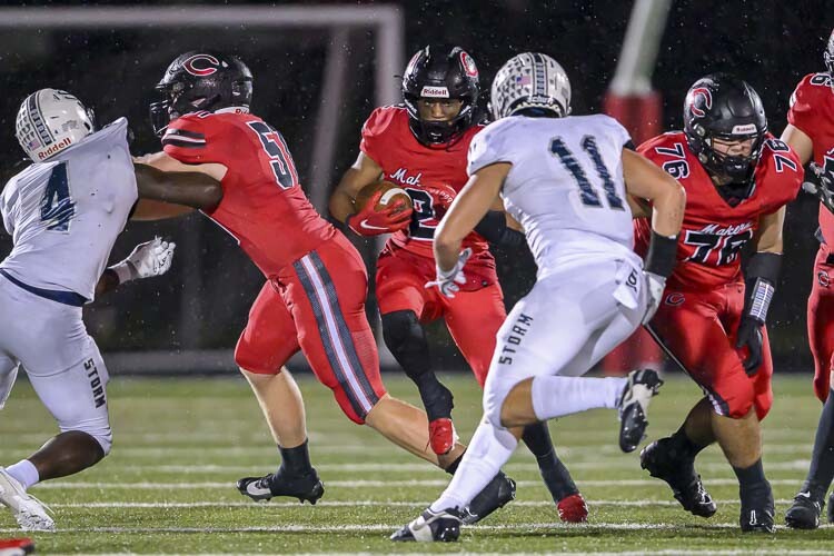 Titan Brody was a workhorse for the Camas Papermakers on Friday night, compiling 90 yards of rushing behind the solid work of the Camas offensive line. Photo courtesy Howard Hawk