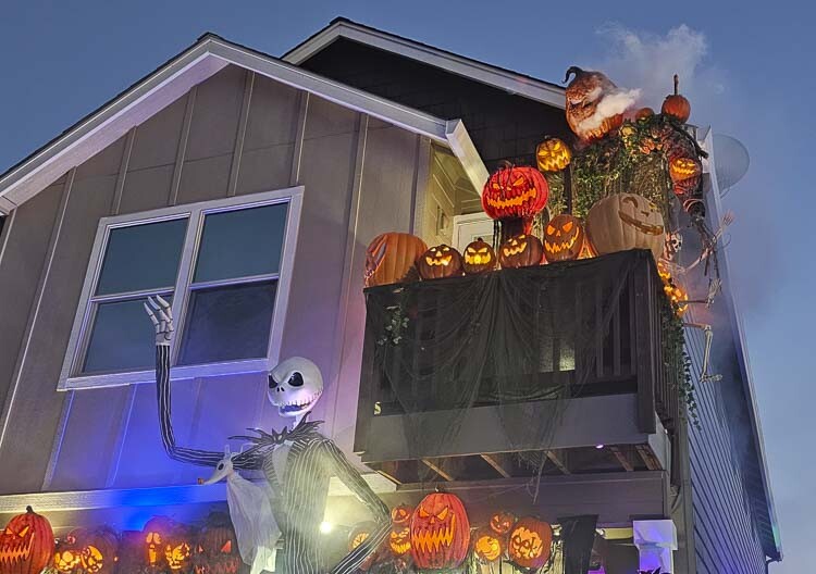 This showcase at a townhome is proof that one does not need to live in a large house with a big yard in order to create Halloween magic. Photo by Paul Valencia