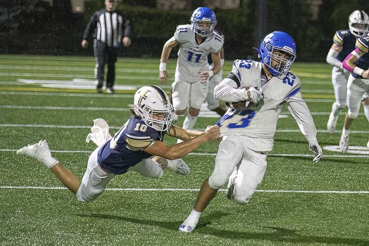 Jalen Ward of La Center maintained his focus all night, and he would go on to score La Center’s first touchdown in its comeback victory over Seton Catholic. Photo by Mike Schultz