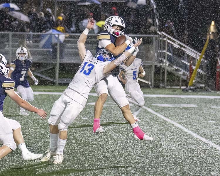 Seton Catholic’s Joe Callerame came up with this interception Friday night. The Seton defense frustrated La Center’s offense most of the night until La Center rallied to win late in the game. Photo by Mike Schultz