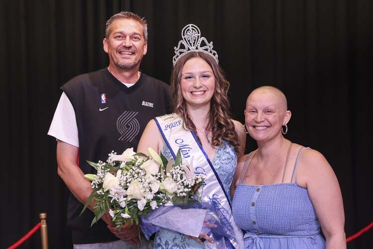 Kylee Mills was crowned Miss Teen La Center this summer, here celebrating with her dad Greg and mom Alexis. Alexis is battling breast cancer. This week, La Center High School and the volleyball program honored Alexis. Photo courtesy Sheri Backous