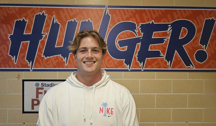 Danny McDonnell of Ridgefield is all smiles, back on the football field after a back injury sustained over the summer. He is grateful he only missed two games in his senior season with the Spudders. Photo by Paul Valencia