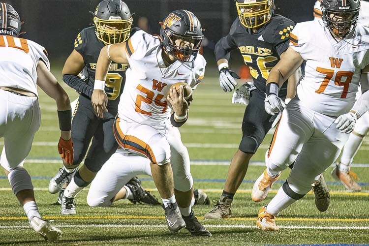 Will Cooper of Washougal said he loved being part of the “two-headed dragon,” describing his team’s ability to run and throw the ball on Friday. Washougal beat Hudson’s Bay 55-14. Photo by Mike Schultz