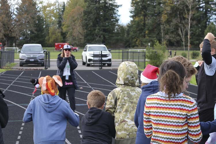 CRGE Boosters volunteer Annie Thomas kicks off the running club for 5th grade students at CRGE. Photo courtesy Washougal School District