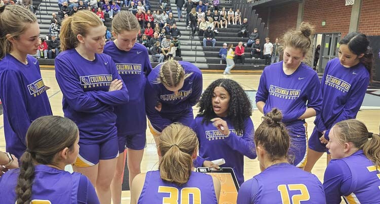 Tee Anderson gives instruction to the Columbia River girls basketball team Wednesday. Anderson is the new head coach for the Rapids. Her first game was Wednesday, at Union High School, the place Anderson shined as a high school athlete. Photo by Paul Valencia