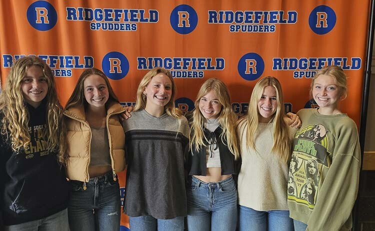Ridgefield soccer players Gabriela Semlick, Madison Ruddy, Keaira Farley, Ava Kruckenberg, Nora Martin, and Ellie Petersen are all smiles after helping the Spudders win the Class 2A state championship last week. Photo by Paul Valencia