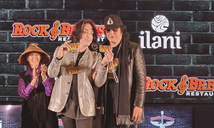 Paul Stanley and Gene Simmons of the rock band Kiss hold up necklaces that were presented to them by the Cowlitz Tribe on Tuesday at ilani. Stanley and Simmons are co-founders of Rock & Brew Restaurants, with the 24th restaurant in the chain scheduled to open at ilani in the spring of 2024. Photo by Paul Valencia