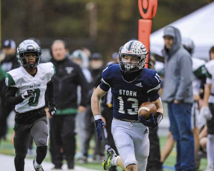 Jerrid Secor returns an interception for a touchdown during Skyview’s state playoff win over Skyline. Photo courtesy Chris Barker