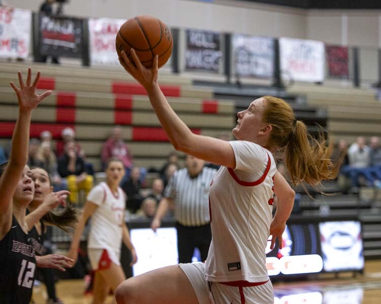 Addison Harris drives to the hoop for two of her 17 points Friday night as Camas topped defending state champion Eastlake. Photo by Mike Schultz