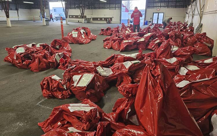 In all, there were more than 1,500 bags of toys that were picked up and delivered throughout Clark County on Sunday as part of Santa’s Posse. Photo by Paul Valencia