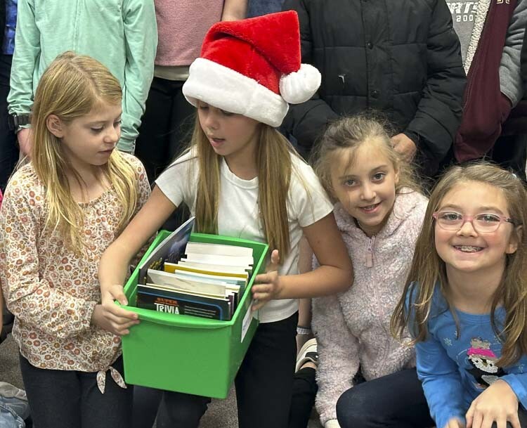 Students look at books donated by Camas-Washougal Rotary Club. Photo courtesy Washougal School District