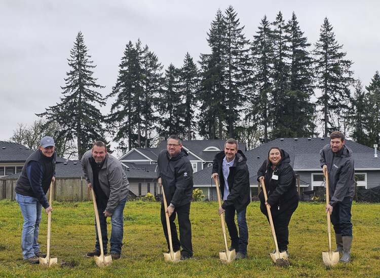 Builders and others who are working on the 2024 GRO Parade of Homes break ground on the site Wednesday in Vancouver. There will be three new homes, valued from $2 million to $3 million, that will be on display for the Parade in September. Photo by Paul Valencia