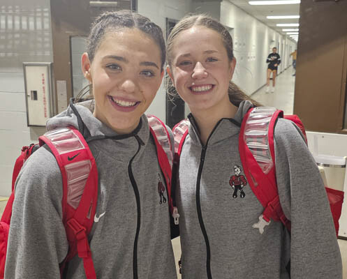 Camas freshman Lauren Hood (left) and sophomore Baylie Farra had big moments Thursday in the state quarterfinal, a game that allowed for every member of the team to get minutes on the state tournament court. Photo by Paul Valencia