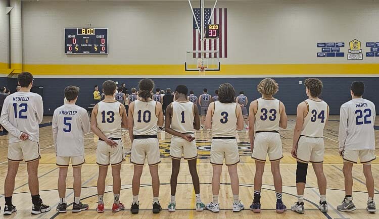 The coach of Columbia Adventist Academy said he loves coaching this group because there are no egos. The Kodiaks all play for each other. Photo by Paul Valencia