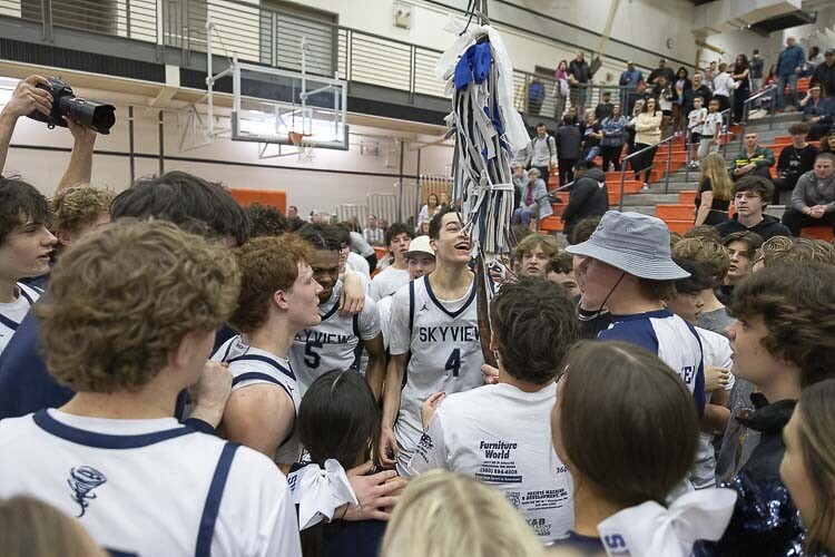 The Skyview Storm celebrate with their fans after Saturday’s win in the state regionals at Battle Ground High School. Photo by Mike Schultz