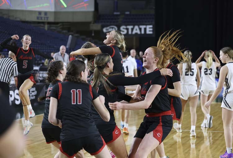 The Camas girls’ basketball team celebrated what Coach Scott Thompson called “a storybook ending’’ to their season with a victory in the Class 4A state championship game Saturday at the Tacoma Dome. Photo courtesy Mike Schultz