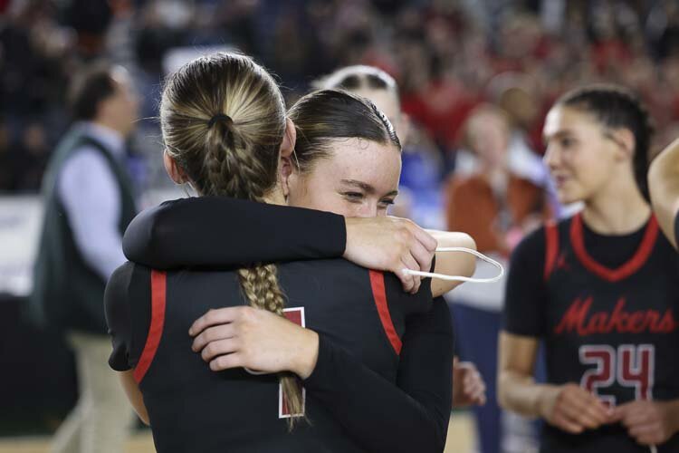 Camas senior Reagan Jamison (1) and junior Keirra Thompson share a victory embrace after Saturday’s championship game victory. Photo courtesy Mike Schultz