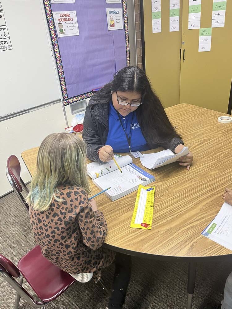 Participating students may earn college credit and become certified paraeducators upon graduating high school. Photo courtesy Woodland School District