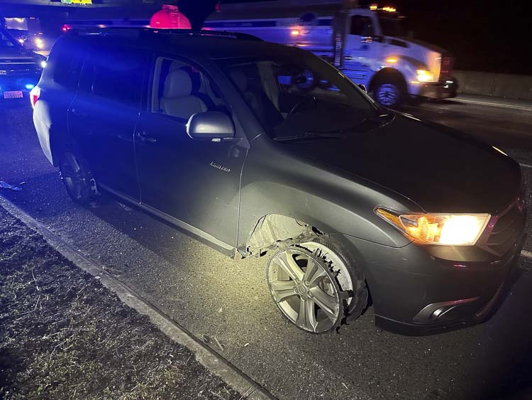 Suspect vehicle with tire damage. Photo courtesy Clark County Sheriff’s Office