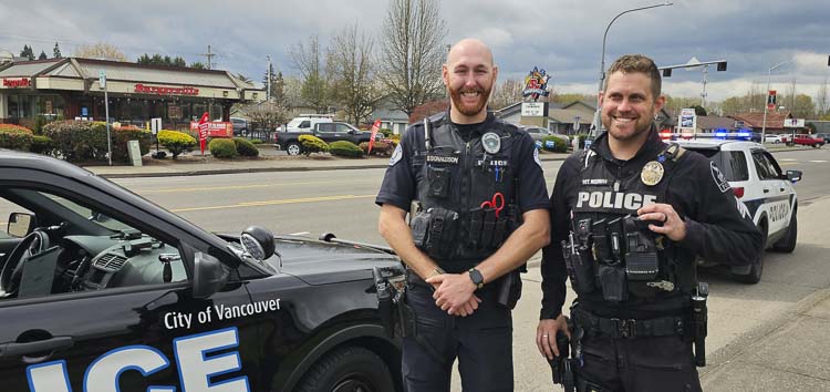 Sean Donaldson of Vancouver Police Department and Andy Marvitz of Ridgefield Police Department were in Battle Ground last week, along with law enforcement officials from various departments, performing emphasis patrols to stop distracted drivers. Photo by Paul Valencia
