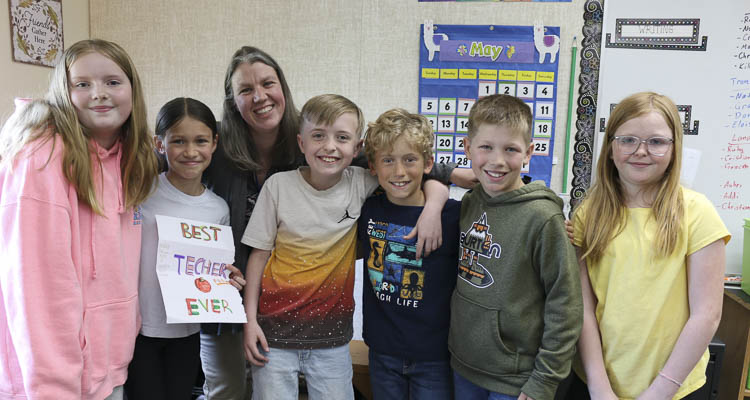 Students in Renae Skar’s fourth grade class stand with Skar in their classroom at Hockinson Heights Elementary School. Photo courtesy Hockinson School District