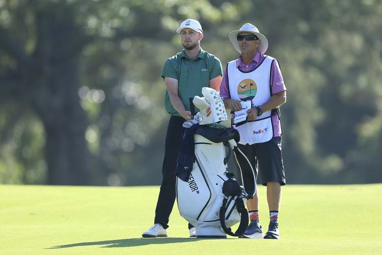 Alistair Docherty and caddy Brandon “Brando” Winton discuss strategy during the Myrtle Beach Classic earlier this month. Photo courtesy Alistair Docherty