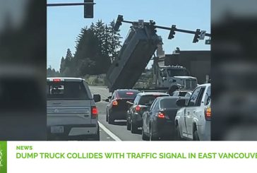 VIDEO: Dump truck collides with traffic signal in East Vancouver