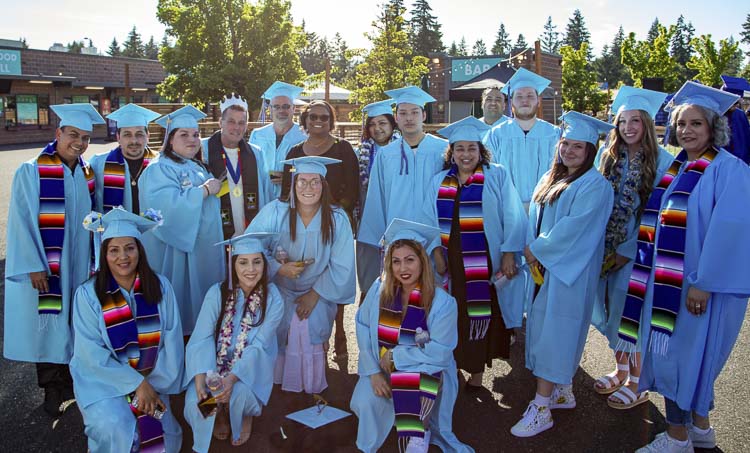 Clark College President Dr. Karin Edwards is shown here with high school graduates at Thursday’s ceremony. Photo courtesy Clark College Communications