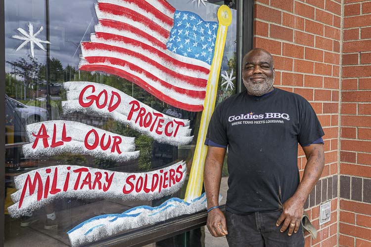 Charles Bibens, shown here in front of Goldies BBQ in 2020, is hoping he can continue his restaurant at a new location. Photo by Mike Schultz