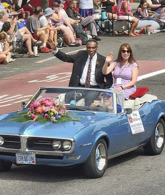 Greg McKelvey, who is retiring after more than 40 years in music education and has been the band director at Battle Ground High School for decades, was the grand marshal of the Grand Floral Parade in Portland. He and his wife Connie opened the parade and led the bands, floats, horses, clowns, and more through the streets of Portland. Photo courtesy McKelvey’s Facebook page